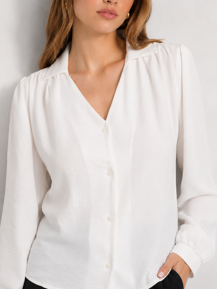 BLUSA MANGA LARGA CUELLO V Y BOTONES AL FRENTE